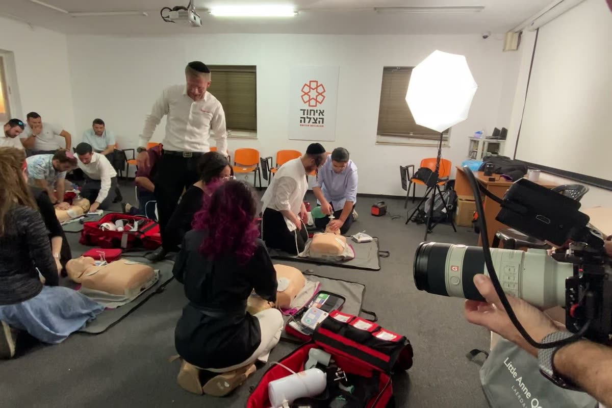 Filming a CPR training class for United Hatzalah. Our light is on the far wall and the camera is in shot